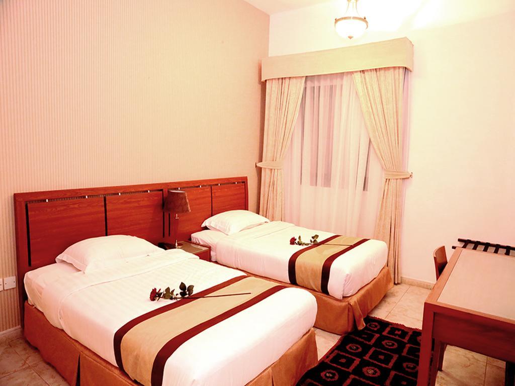 الشارقة Arcadia Hotel Suites الغرفة الصورة