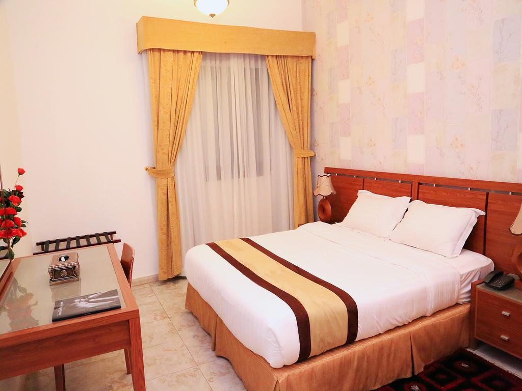 الشارقة Arcadia Hotel Suites الغرفة الصورة