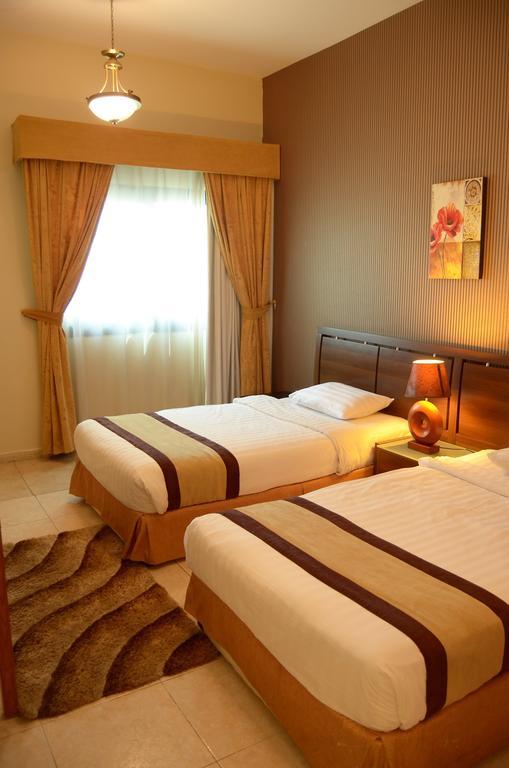 الشارقة Arcadia Hotel Suites المظهر الخارجي الصورة